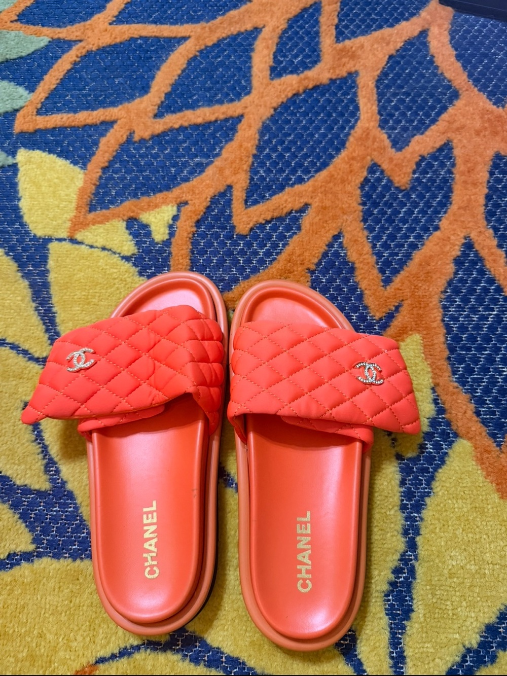 CHANEL Quilted Slide Sandals in Bright Coral